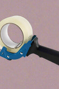 Mouse trap style tape gun in hand during use

Tape gun dispenser with ergonomic grip and metal body

Close-up of T250426 heavy-duty tape gun loading area

Heavy-duty black and blue packing tape dispenser

Shipping tape dispenser shown with standard tape roll

