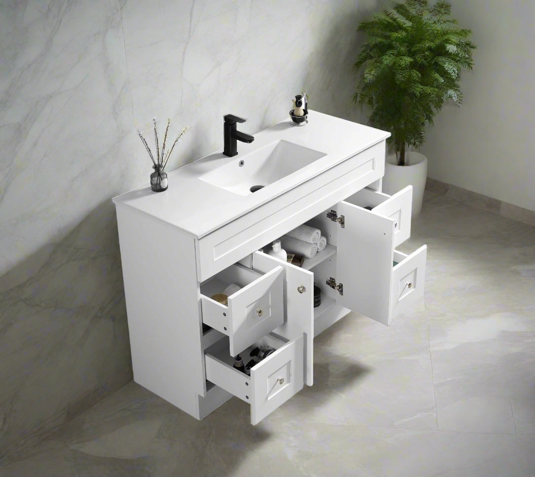 Newport vanity countertop view showing rectangular ceramic sink and Carrara marble finish