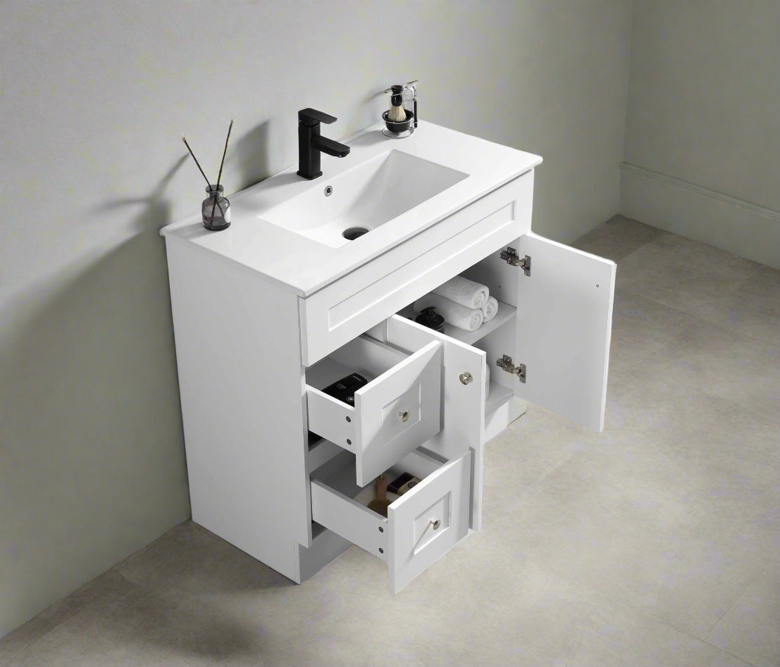 Newport vanity countertop view showing rectangular ceramic sink and Carrara marble finish