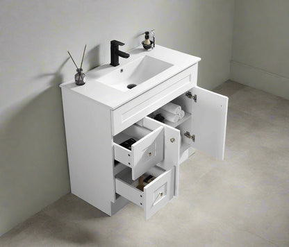 Newport vanity countertop view showing rectangular ceramic sink and Carrara marble finish
