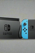“Nintendo Switch open box console with red & blue Joy-Con controllers”

“TV tabletop and handheld gaming modes on Nintendo Switch”

“Nintendo Switch console accessories included in open box”