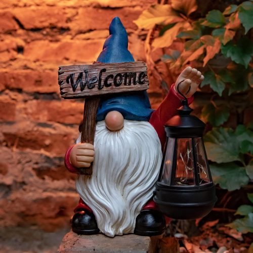 Resin gnome statue holding solar-powered lantern
Blue welcome garden gnome with LED light for patio
Solar-powered outdoor lawn gnome for porch or walkway