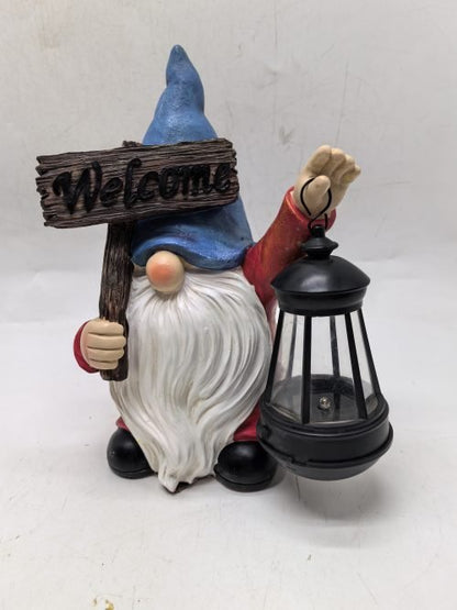 Resin gnome statue holding solar-powered lantern
Blue welcome garden gnome with LED light for patio
Solar-powered outdoor lawn gnome for porch or walkway