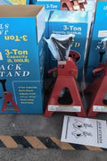 “Pair of red heavy-duty jack stands on concrete garage floor”

“6-ton jack stands with ratchet and locking pin”

“12-ton jack stands supporting heavy-duty pickup truck”