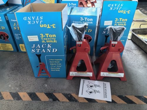“Pair of red heavy-duty jack stands on concrete garage floor”

“6-ton jack stands with ratchet and locking pin”

“12-ton jack stands supporting heavy-duty pickup truck”