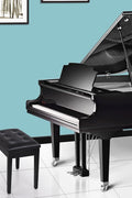 "Adjustable black faux leather piano bench with padded cushion and hidden storage – Model LPB55H"