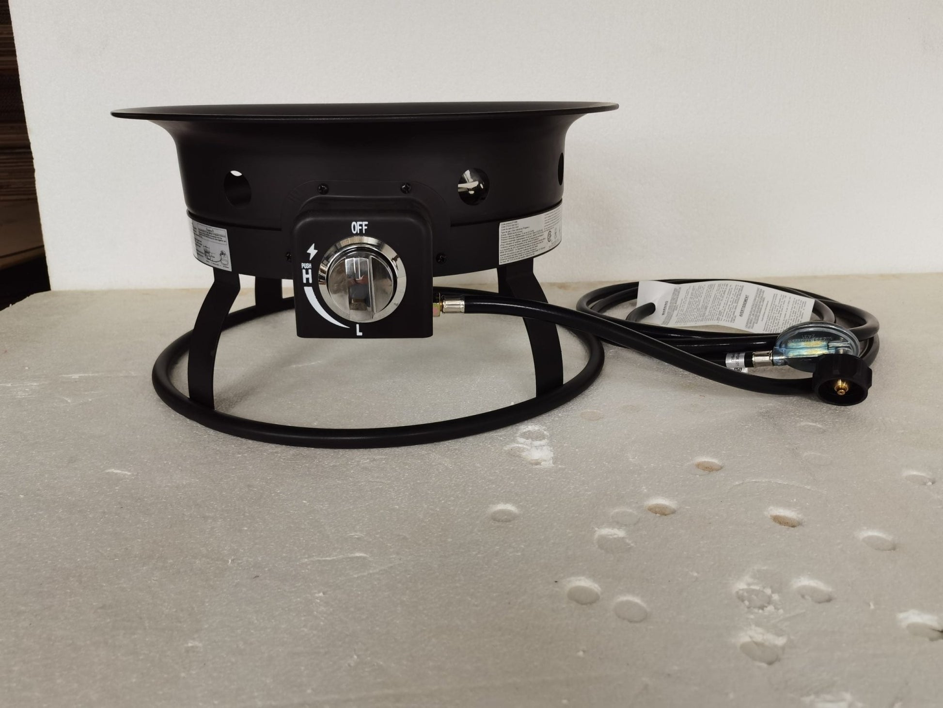 52,000 BTU propane fire pit with lava rocks burning

portable camping fire pit with BBQ grill top

outdoor propane fire pit kit with hose and stand

black fire pit for patio and tailgate cooking

propane gas fire pit with included lava rocks