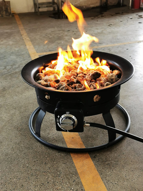 52,000 BTU propane fire pit with lava rocks burning

portable camping fire pit with BBQ grill top

outdoor propane fire pit kit with hose and stand

black fire pit for patio and tailgate cooking

propane gas fire pit with included lava rocks