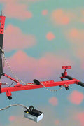 Portable 10-ton auto body frame puller red model F1000 side view

Complete auto frame straightening set with air pump hose and coupler

L-shaped frame puller tool setup for body shop repair

Pneumatic pump connected to vehicle frame puller in garage

Heavy-duty red portable frame puller with control handle F1000
