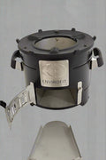 Portable charcoal stove for outdoor cooking

Compact camping stove for wood or charcoal

Lightweight stove in backyard grill setup

Charcoal-burning camp stove in use

Dual-fuel stove with steel body design