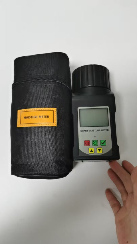 Digital grain moisture tester showing LCD screen readings

MT2599 grain tester with large sample chamber

Portable moisture meter for field and warehouse use

Moisture tester measuring corn sample

Digital analyzer for wheat, rice, cocoa, and coffee beans