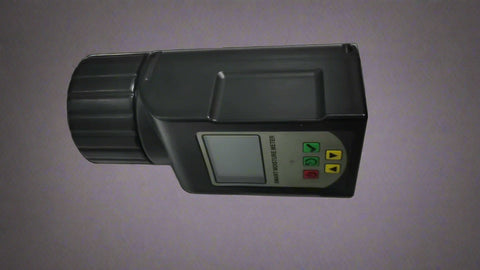 Digital grain moisture tester showing LCD screen readings

MT2599 grain tester with large sample chamber

Portable moisture meter for field and warehouse use

Moisture tester measuring corn sample

Digital analyzer for wheat, rice, cocoa, and coffee beans