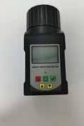 Digital grain moisture tester showing LCD screen readings

MT2599 grain tester with large sample chamber

Portable moisture meter for field and warehouse use

Moisture tester measuring corn sample

Digital analyzer for wheat, rice, cocoa, and coffee beans