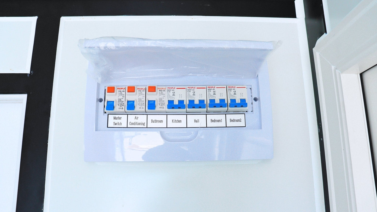 Exterior view of 2-bedroom deluxe folding house

Modern prefabricated orange modular home

Inside view of compact folding prefab unit

Kitchen area with electric setup in prefab home

Folding house with porch roof kit variant