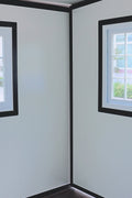 Exterior view of 2-bedroom deluxe folding house

Modern prefabricated orange modular home

Inside view of compact folding prefab unit

Kitchen area with electric setup in prefab home

Folding house with porch roof kit variant