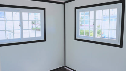 Exterior view of 2-bedroom deluxe folding house

Modern prefabricated orange modular home

Inside view of compact folding prefab unit

Kitchen area with electric setup in prefab home

Folding house with porch roof kit variant