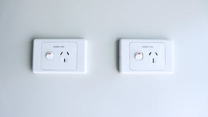 Exterior view of 2-bedroom deluxe folding house

Modern prefabricated orange modular home

Inside view of compact folding prefab unit

Kitchen area with electric setup in prefab home

Folding house with porch roof kit variant