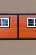 Exterior view of 2-bedroom deluxe folding house

Modern prefabricated orange modular home

Inside view of compact folding prefab unit

Kitchen area with electric setup in prefab home

Folding house with porch roof kit variant