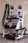 Main view of professional auto body dent welder machine

Welding gun and accessory layout in body shop

Open kit showing stud welder and tools

Slide hammer and puller accessories in case

Operational view of dent repair welder setup