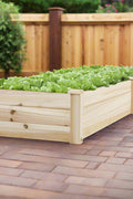 Raised wooden garden bed with central divider
Fir wood planter box assembled on backyard patio
Top view of divided raised bed filled with soil
Close-up of wooden planks and joinery for the garden box
Large rectangular raised garden bed for herbs and vegetables