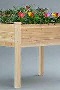 Wood raised garden bed with green greenhouse cover for backyard gardening

Elevated outdoor planter box with legs and protective greenhouse top

Side view of wooden garden planter for vegetables or herbs

Assembled raised garden box with protective cover and ventilation flap