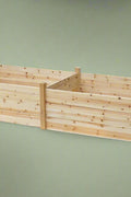 Extra-large raised wooden garden planter box 34x95x19 inches

Deep outdoor fir wood vegetable garden bed with high sides

Assembled a large garden planter on the patio for herbs and greens

Spacious backyard garden box for root vegetables

Wooden raised planter RGB508 with tool-free assembly