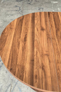 Reeded extendable dining table in a modern kitchen
Close-up of woodgrain tabletop texture
Side view showing the table expansion mechanism
Modern farmhouse dining table in retracted state
Seating for 4–8 guests with expandable design