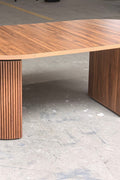 Reeded extendable dining table in a modern kitchen
Close-up of woodgrain tabletop texture
Side view showing the table expansion mechanism
Modern farmhouse dining table in retracted state
Seating for 4–8 guests with expandable design