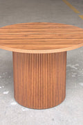 Reeded extendable dining table in a modern kitchen
Close-up of woodgrain tabletop texture
Side view showing the table expansion mechanism
Modern farmhouse dining table in retracted state
Seating for 4–8 guests with expandable design