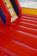 Red and blue bouncy castle with inflatable slide for commercial rental
18 ft long PVC inflatable bounce house and slide combo
Durable rental-grade inflatable with blower and safety features
Side view of heavy-duty bouncy castle in vibrant colors
Inflatable slide combo designed for kids' events and parties