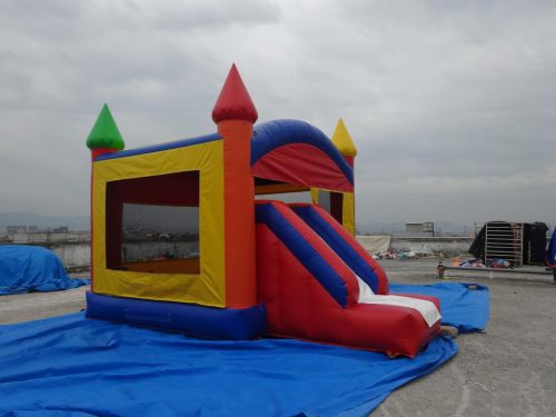 Red and blue bouncy castle with inflatable slide for commercial rental
18 ft long PVC inflatable bounce house and slide combo
Durable rental-grade inflatable with blower and safety features
Side view of heavy-duty bouncy castle in vibrant colors
Inflatable slide combo designed for kids' events and parties