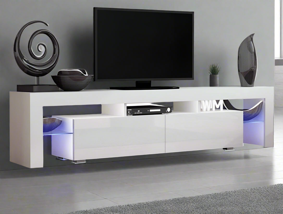 Modern RGB LED TV stand with lights under flat-screen TV
Black gloss entertainment unit with RGB lights in living room
White TV console with open shelving and LED lighting
Stylish high gloss media cabinet with mood lighting
Contemporary entertainment center for 75 inch TVs
