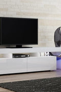 Modern RGB LED TV stand with lights under flat-screen TV
Black gloss entertainment unit with RGB lights in living room
White TV console with open shelving and LED lighting
Stylish high gloss media cabinet with mood lighting
Contemporary entertainment center for 75 inch TVs
