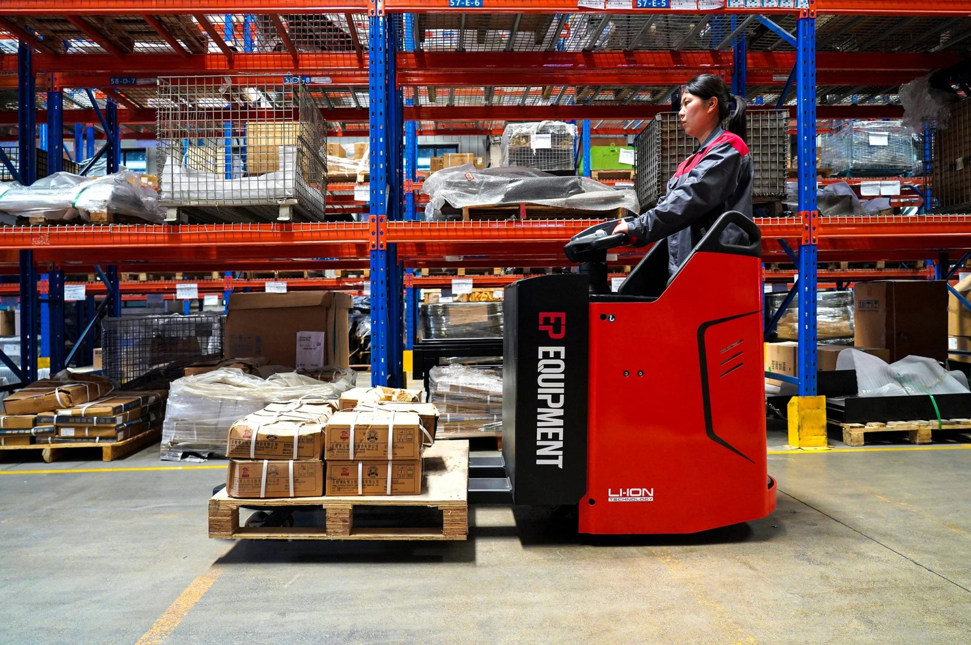 "Ride-on electric pallet jack truck with 4400 lb capacity for warehouse logistics"

"Heavy-duty red electric pallet jack truck with lithium battery VPT20SR"

"Battery-powered pallet jack forklift for long-distance warehouse transport"

"Industrial ride-on pallet jack with ergonomic operator platform"