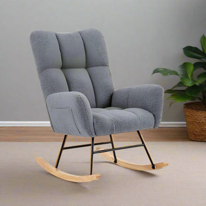 Gray ergonomic glider rocking chair for nursery with wood base
White soft upholstered rocking chair with curved wood base
Rocking chair for the living room with ergonomic support and plush padding