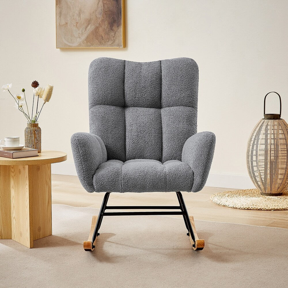 Gray ergonomic glider rocking chair for nursery with wood base
White soft upholstered rocking chair with curved wood base
Rocking chair for the living room with ergonomic support and plush padding