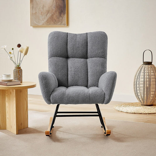 Gray ergonomic glider rocking chair for nursery with wood base
White soft upholstered rocking chair with curved wood base
Rocking chair for the living room with ergonomic support and plush padding