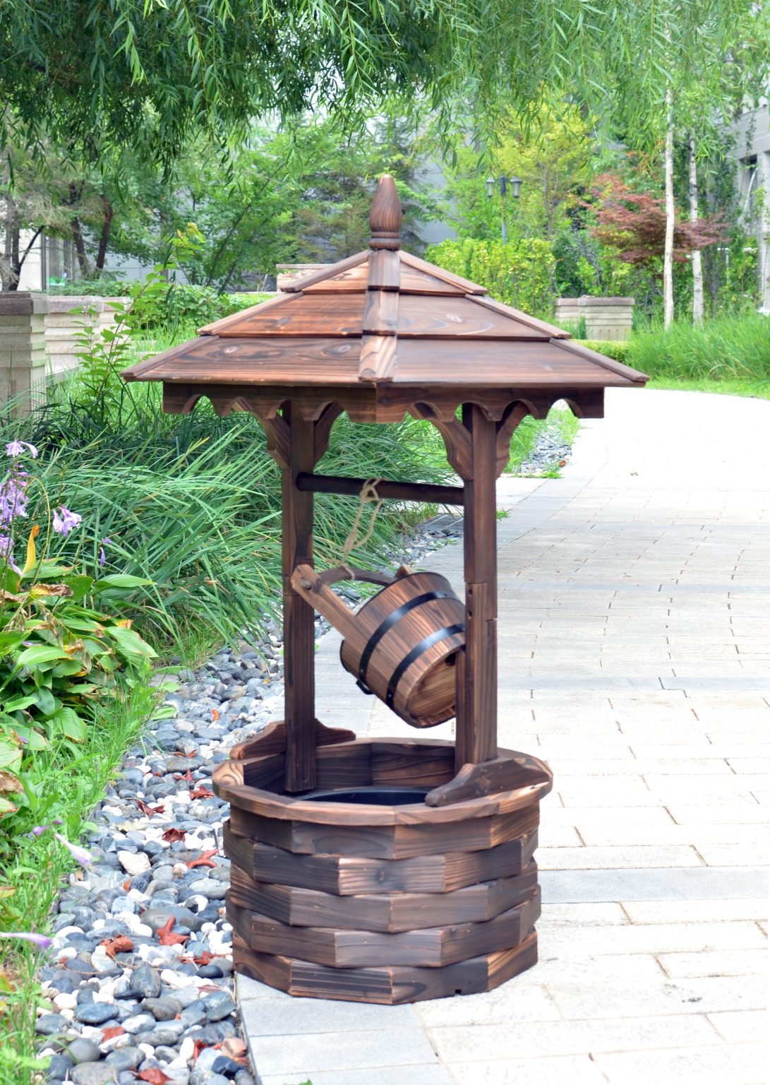 wooden garden water fountain with rustic barrel design

round outdoor fountain made of solid fir wood

vintage patio water feature with continuous water flow

backyard decor fountain with soothing water sound

rustic outdoor wooden barrel fountain placed in garden