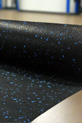 Rubber Gym Roll Flooring – Blue Speck Finish 3.28 ft x 32.80 ft
Rubber Gym Roll Flooring Installed in Fitness Studio
Black Rubber Roll Mat for Gym and Garage Floors
CrossFit Gym with Rubber Flooring Roll