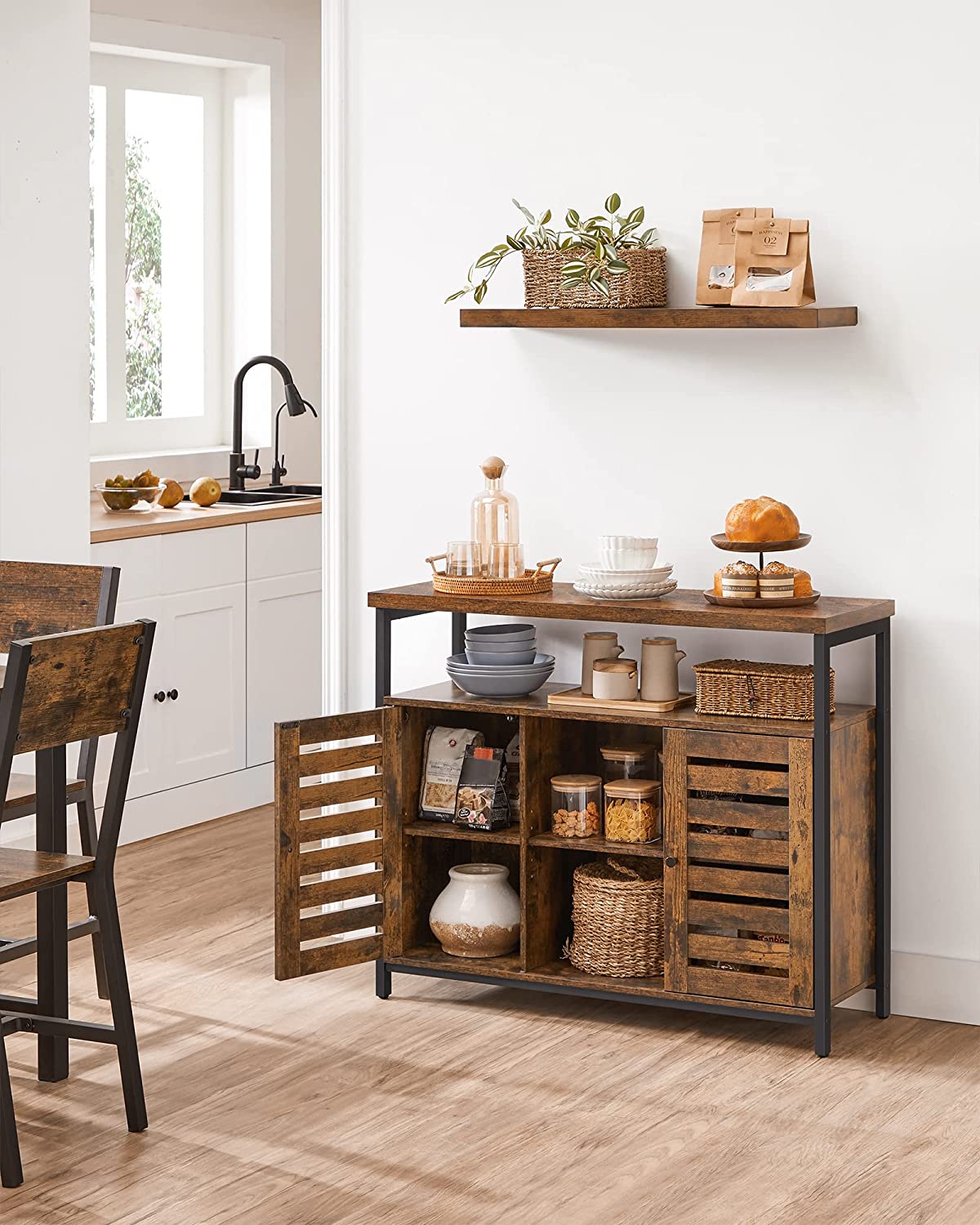Rustic buffet cabinet with two louvered doors and adjustable shelves
Brown sideboard with open storage compartments and steel legs
Side view of rustic farmhouse cabinet in living room
Top surface of buffet cabinet styled with dishes and decor
Inside view of adjustable shelves and storage compartments
