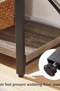 "Rustic 3-tier console table with wood-look MDF shelves and black steel frame, ideal for entryway or living room storage"