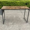 Rustic industrial computer desk with metal frame and storage hook – TLD003
Compact wood top desk with bag holder and steel legs – Model TLD003