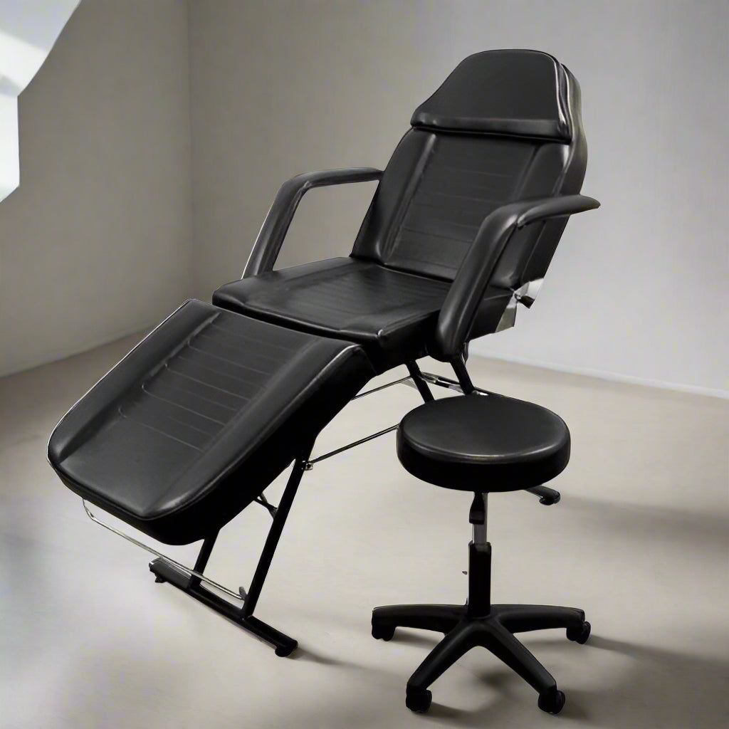 Salon bed adjusted upright as barber or esthetician chair

