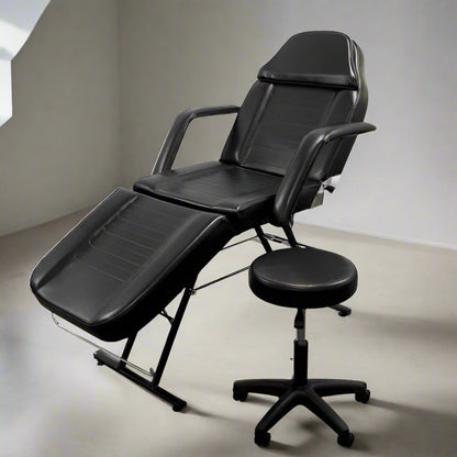 Salon bed adjusted upright as barber or esthetician chair

