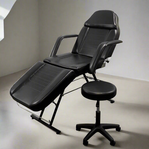Salon bed adjusted upright as barber or esthetician chair

