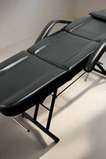 Black adjustable salon massage bed with stool – PVC leather and steel frame