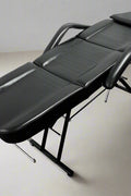 Tattoo or facial bed in fully reclined position with waterproof PVC leather

