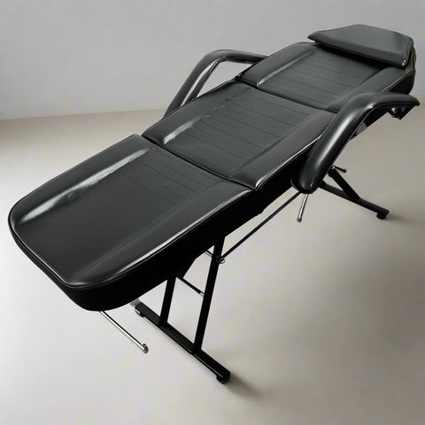 Tattoo or facial bed in fully reclined position with waterproof PVC leather

