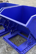 “Blue self-dumping steel tilt hopper for industrial waste”

“Industrial garbage bin tipper with fork pockets”

“Heavy-duty steel tilt hopper with blue powder-coated finish”