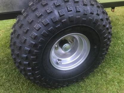 Single Axle ATV Dump Trailer TB500 – 1,000 lb capacity with steep dump angle and pneumatic tires for heavy-duty hauling